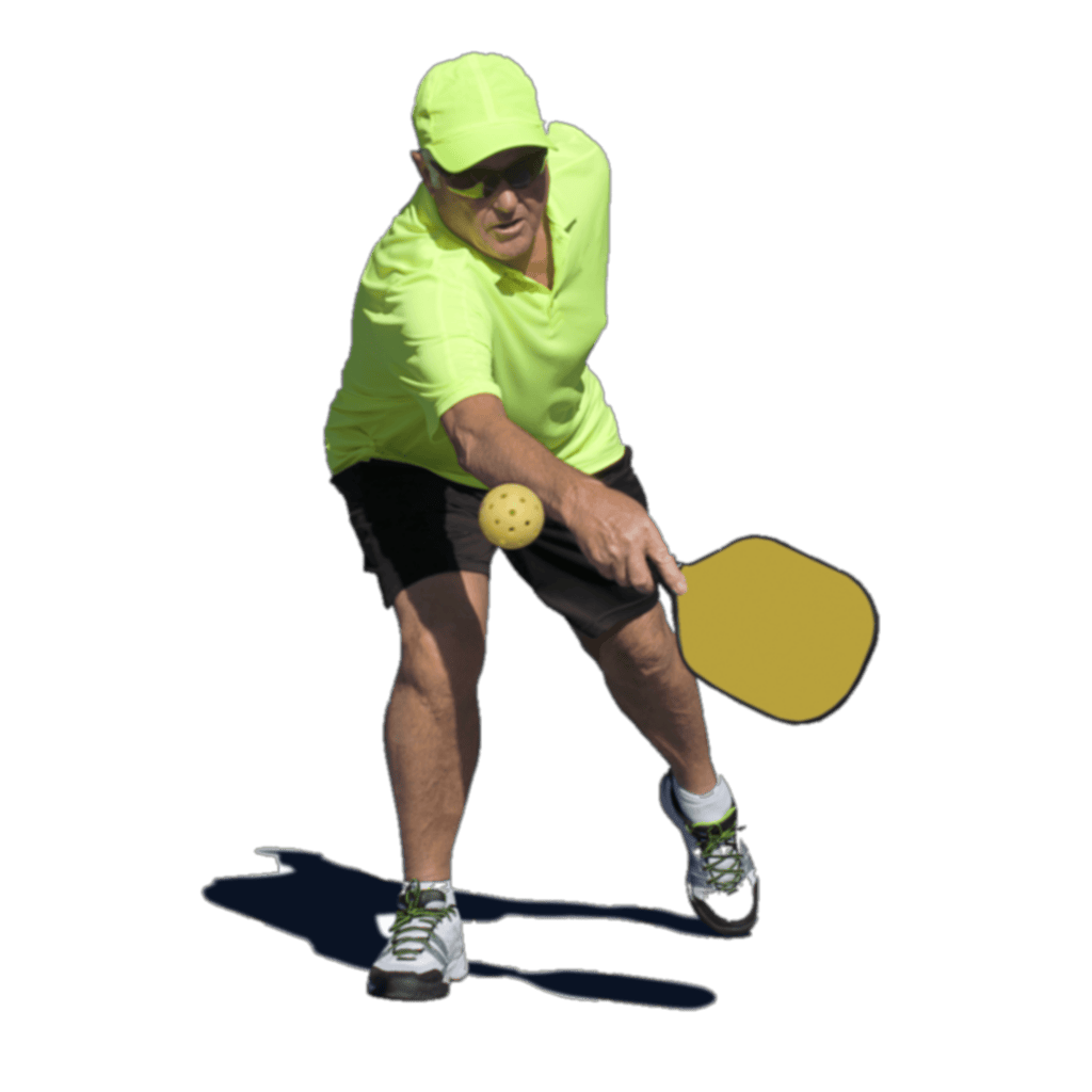 man in neon yellow shirt playing pickleball